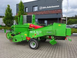 Gebr. UNIA Vollernter mit Rollbodenbunker